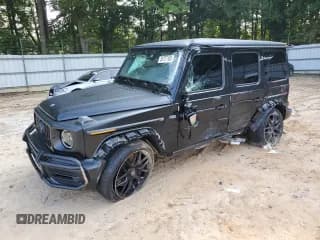 ✅ 2023 Mercedes-Benz G 63 AMG • VIN: W1NYC7HJ5PX470020 • Lot: 58737105. Wystawiony na Copart z przebiegiem 9 170 mil. Bezpłatny archiwum sprzedaży aukcyjnych z USA i szczegółowy raport historii pojazdu na DreamBid. Zdjęcie 1.