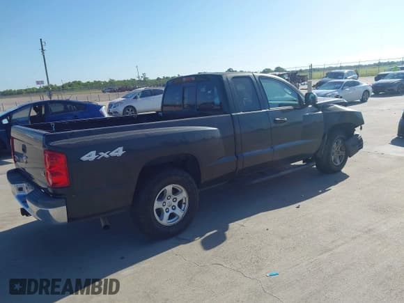 ✅ 2006 Dodge Dakota SLT • VIN: 1D7HW42N06S718488 • Лот: 42776180. Опубликован ранее на IAAI с пробегом 61 944 миль. Бесплатный доступ к архиву аукционных продаж из США и подробный отчёт об истории автомобиля на DreamBid. Изображение 4.