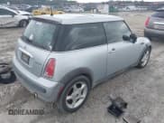 ✅ 2004 MINI Hardtop • VIN: WMWRC33414TJ57004 • Lot: 43058084. Listed on IAAI with 165,723 mi. Free auction sales archive from the USA and detailed vehicle history report at DreamBid. Image 4.