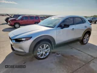 ✅ 2021 Mazda CX-30 Select • VIN: 3MVDMABL2MM251171 • Лот: 84635525. Опубликован ранее на Copart с пробегом 32 402 миль. Бесплатный доступ к архиву аукционных продаж из США и подробный отчёт об истории автомобиля на DreamBid. Изображение 1.