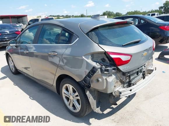 2017 Chevrolet Cruze LT with VIN 3G1BE6SMXHS587737, listed as a IAAI auction lot 43127981 with 134,419 mi miles and . Bid and sale history available at DreamBid. Image 3.