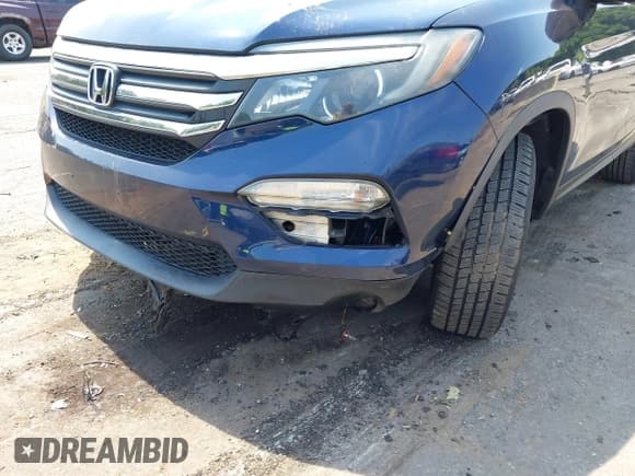 ✅ 2018 Honda Pilot EX-L • VIN: 5FNYF6H5XJB013698 • Lot: 42986201. Listed on IAAI with 63,873 mi. Free auction sales archive from the USA and detailed vehicle history report at DreamBid. Image 14.