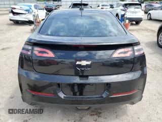 2015 Chevrolet Volt z VIN 1G1RB6E49FU140977, wystawiony jako Copart lot #61305373 z przebiegiem 156 688 mil mil oraz . Historia ofert i sprzedaży dostępna na DreamBid. Obrazek 6.