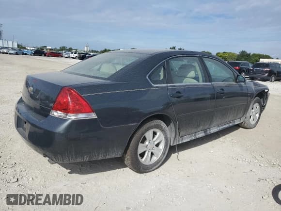 ✅ 2015 Chevrolet Impala LS • VIN: 2G1WA5E3XF1128419 • Lot: 90256005. Wystawiony na Copart z przebiegiem 171 223 mil. Bezpłatny archiwum sprzedaży aukcyjnych z USA i szczegółowy raport historii pojazdu na DreamBid. Zdjęcie 3.