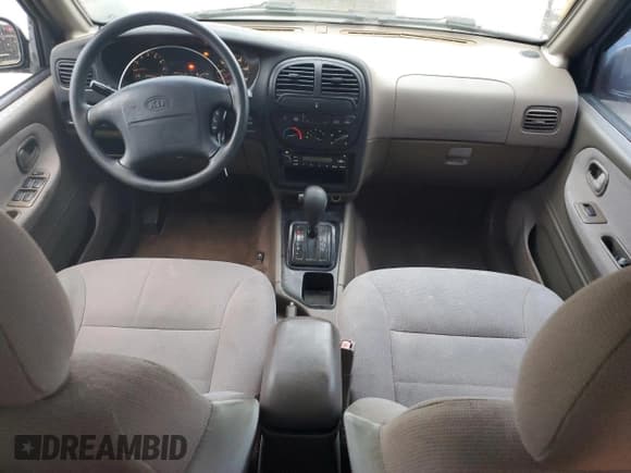 ✅ 2002 Kia Sportage • VIN: KNDJB723225136909 • Lot: 72007115. Listed on Copart with 107,720 mi. Free auction sales archive from the USA and detailed vehicle history report at DreamBid. Image 8.