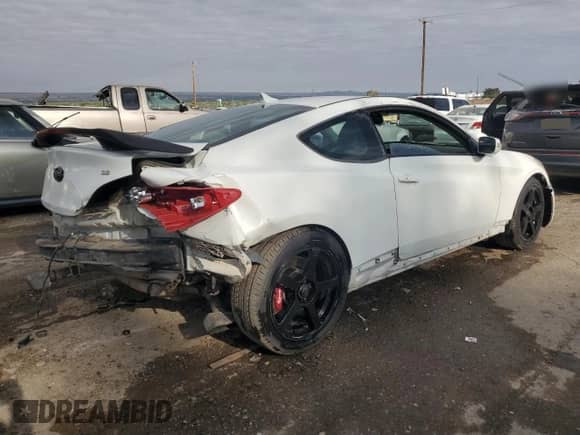 2012 Hyundai Genesis Coupe Track с VIN KMHHU6KH9CU074930, выставлен на аукционе Copart как лот 70231844 с пробегом 106 225 миль миль и Списание • Salvage title. История ставок и продаж доступна на DreamBid. Изображение 3.
