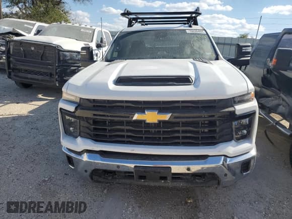 ✅ 2024 Chevrolet Silverado 2500HD Work Truck • VIN: 1GC0WLE79RF394369 • Лот: 76630484. Опубликован ранее на Copart с пробегом Не указан. Бесплатный доступ к архиву аукционных продаж из США и подробный отчёт об истории автомобиля на DreamBid. Изображение 5.
