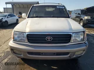 ✅ 1999 Toyota Land Cruiser • VIN: JT3HT05J8X0049750 • Лот: 77547144. Опубликован ранее на Copart с пробегом 168 435 миль. Бесплатный доступ к архиву аукционных продаж из США и подробный отчёт об истории автомобиля на DreamBid. Изображение 5.