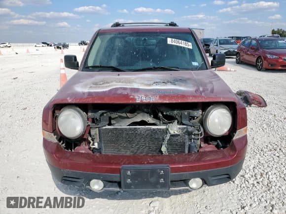 ✅ 2014 Jeep Patriot Latitude • VIN: 1C4NJPFB7ED602883 • Лот: 84064185. Опубликован ранее на Copart с пробегом Не указан. Бесплатный доступ к архиву аукционных продаж из США и подробный отчёт об истории автомобиля на DreamBid. Изображение 5.