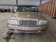 ✅ 2000 Mercedes-Benz C 230/260/280/320 • VIN: WDBHA29G9YA806709 • Lot: 64520855. Wystawiony na Copart z przebiegiem 78 480 mil. Bezpłatny archiwum sprzedaży aukcyjnych z USA i szczegółowy raport historii pojazdu na DreamBid. Zdjęcie 5.