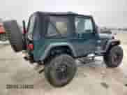 2005 Jeep Wrangler X с VIN 1J4FA39S35P333959, выставлен на аукционе Copart как лот 59576665 с пробегом 261 856 миль миль и Списание • Salvage title. История ставок и продаж доступна на DreamBid. Изображение 3.