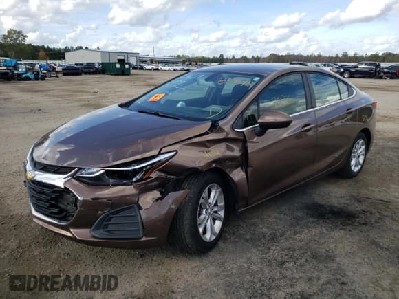 ✅ 2019 Chevrolet Cruze LT • VIN: 1G1BE5SM4K7115842 • Lot: 65729542. Listed on Copart with 70,536 mi. Free auction sales archive from the USA and detailed vehicle history report at DreamBid. Image 2.