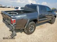 ✅ 2023 Toyota Tacoma TRD Off Road • VIN: 3TYCZ5AN0PT165987 • Lot: 90329665. Listed on Copart with 24,860 mi. Free auction sales archive from the USA and detailed vehicle history report at DreamBid. Image 3.