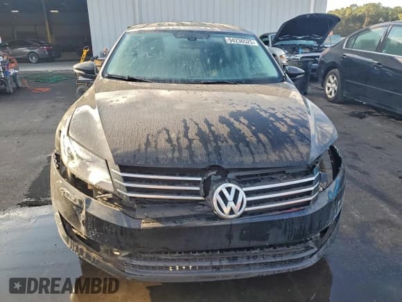 ✅ 2012 Volkswagen Passat SE • VIN: 1VWBP7A31CC034678 • Lot: 94236525. Listed on Copart with 144,835 mi. Free auction sales archive from the USA and detailed vehicle history report at DreamBid. Image 5.