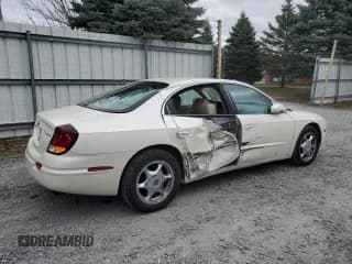 ✅ 2001 Oldsmobile Aurora • VIN: 1G3GS64CX14180971 • Lot: 79035554. Wystawiony na Copart z przebiegiem 62 228 mil. Bezpłatny archiwum sprzedaży aukcyjnych z USA i szczegółowy raport historii pojazdu na DreamBid. Zdjęcie 3.