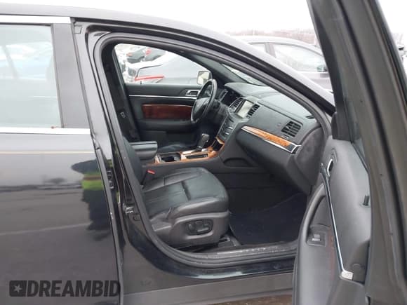 ✅ 2013 Lincoln MKS • VIN: 1LNHL9DK3DG607075 • Lot: 43923231. Listed on IAAI with 122,971 mi. Free auction sales archive from the USA and detailed vehicle history report at DreamBid. Image 5.