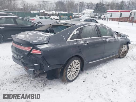✅ 2013 Lincoln MKZ • VIN: 3LN6L2GK0DR825820 • Lot: 41603721. Wystawiony na IAAI z przebiegiem 110 837 mil. Bezpłatny archiwum sprzedaży aukcyjnych z USA i szczegółowy raport historii pojazdu na DreamBid. Zdjęcie 4.