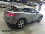 ✅ 2018 Alfa Romeo Stelvio • VIN: ZASFAKAN7J7C01195 • Lot: 82287485. Listed on Copart with 62,431 mi. Free auction sales archive from the USA and detailed vehicle history report at DreamBid. Image 3.