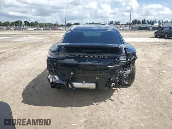 ✅ 2023 Porsche Panamera • VIN: WP0AJ2A7XPL100012 • Лот: 59754695. Опубликован ранее на Copart с пробегом 35 781 миль. Бесплатный доступ к архиву аукционных продаж из США и подробный отчёт об истории автомобиля на DreamBid. Изображение 6.