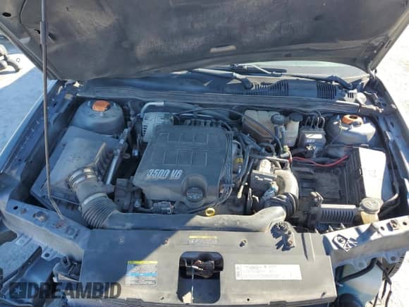 2005 Chevrolet Malibu LS z VIN 1G1ZT52805F261818, wystawiony jako Copart lot #86879855 z przebiegiem 97 589 mil mil oraz Szkoda całkowita • Salvage title. Historia ofert i sprzedaży dostępna na DreamBid. Obrazek 11.