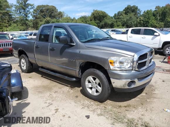 2007 Dodge 1500 SLT z VIN 1D7HU18P77S264612, wystawiony jako Copart lot #69960934 z przebiegiem 202 037 mil mil oraz Szkoda całkowita • Salvage title. Historia ofert i sprzedaży dostępna na DreamBid. Obrazek 4.