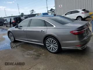 ✅ 2019 Audi A8 • VIN: WAU8DAF87KN018945 • Лот: 57226464. Опубликован ранее на Copart с пробегом 39 530 миль. Бесплатный доступ к архиву аукционных продаж из США и подробный отчёт об истории автомобиля на DreamBid. Изображение 2.
