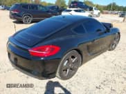 ✅ 2014 Porsche Cayman • VIN: WP0AA2A83EK172830 • Lot: 43477430. Listed on IAAI with 77,939 mi. Free auction sales archive from the USA and detailed vehicle history report at DreamBid. Image 4.