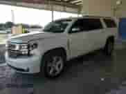 2015 Chevrolet Suburban LTZ z VIN 1GNSKKKC9FR678117, wystawiony jako Copart lot #70138934 z przebiegiem 136 271 mil mil oraz Szkoda całkowita • Salvage title. Historia ofert i sprzedaży dostępna na DreamBid. Obrazek 1.