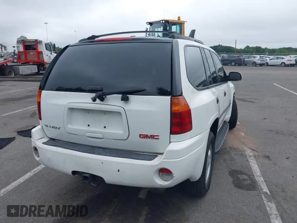 ✅ 2006 GMC Envoy SLE • VIN: 1GKDT13S762251921 • Lot: 42460295. Listed on IAAI with 206,063 mi. Free auction sales archive from the USA and detailed vehicle history report at DreamBid. Image 4.