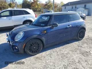 2014 MINI Hardtop with VIN WMWXM5C5XET730895, listed as a Copart auction lot 90530595 with 101,095 mi miles and Salvage title. Bid and sale history available at DreamBid. Image 1.