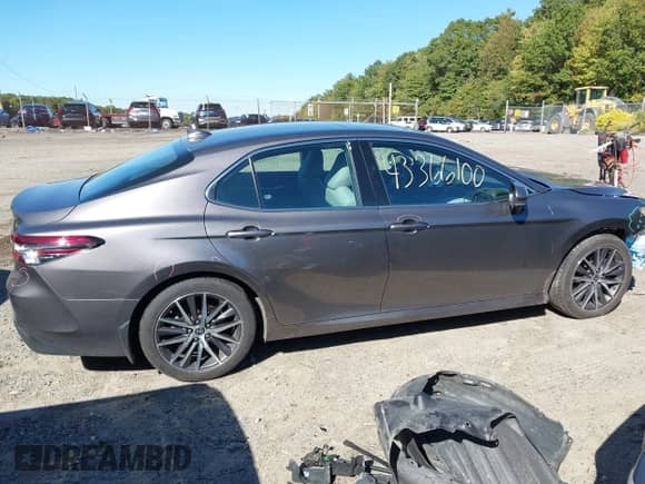 2023 Toyota Camry Hybrid XLE с VIN 4T1F31AK0PU053612, выставлен на аукционе IAAI как лот 43366100 с пробегом 74 858 миль миль и . История ставок и продаж доступна на DreamBid. Изображение 14.