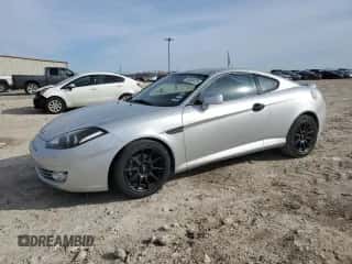 2008 Hyundai Tiburon GS z VIN KMHHM66D68U296212, wystawiony jako Copart lot #88536725 z przebiegiem 116 240 mil mil oraz Szkoda całkowita • Salvage title. Historia ofert i sprzedaży dostępna na DreamBid. Obrazek 1.