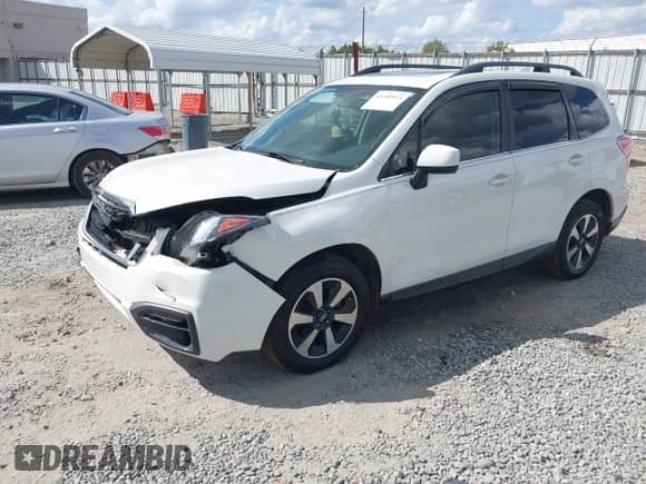 2017 Subaru Forester Limited with VIN JF2SJAJC1HH414553, listed as a IAAI auction lot 43289933 with 120,913 mi miles and . Bid and sale history available at DreamBid. Image 2.