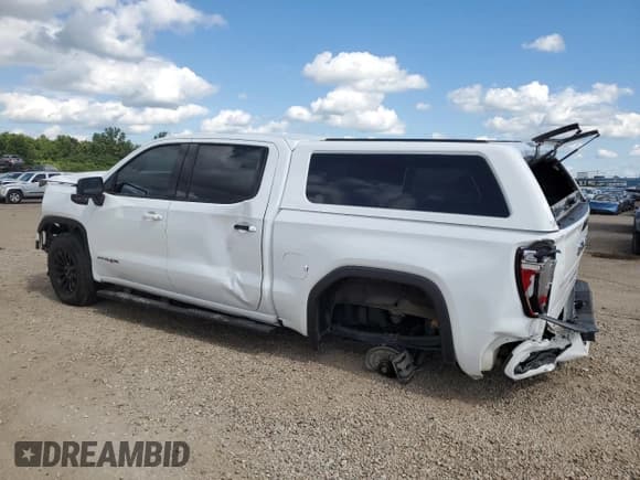 ✅ 2023 GMC Sierra 1500 AT4X • VIN: 3GTUUFELXPG131132 • Лот: 69287445. Опубликован ранее на Copart с пробегом 87 210 миль. Бесплатный доступ к архиву аукционных продаж из США и подробный отчёт об истории автомобиля на DreamBid. Изображение 2.