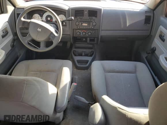 2006 Dodge Dakota ST z VIN 1D7HE28K56S533471, wystawiony jako Copart lot #83462934 z przebiegiem 114 097 mil mil oraz Szkoda całkowita • Salvage title. Historia ofert i sprzedaży dostępna na DreamBid. Obrazek 8.