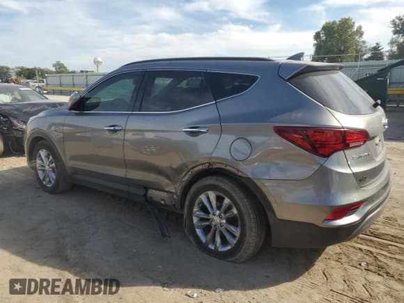 ✅ 2017 Hyundai Santa Fe 2.0T • VIN: 5NMZU4LA5HH041467 • Lot: 81898505. Listed on Copart with 121,360 mi. Free auction sales archive from the USA and detailed vehicle history report at DreamBid. Image 2.