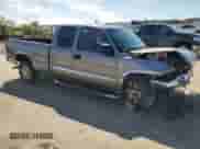 2007 GMC Sierra 1500 SLE1 with VIN 1GTEC19Z27Z175554, listed as a Copart auction lot 72020614 with 161,398 mi miles and Salvage title. Bid and sale history available at DreamBid. Image 4.