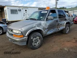 ✅ 2003 Chevrolet Blazer LS • VIN: 1GNDT13X73K152980 • Lot: 71448015. Wystawiony na Copart z przebiegiem 102 250 mil. Bezpłatny archiwum sprzedaży aukcyjnych z USA i szczegółowy raport historii pojazdu na DreamBid. Zdjęcie 1.