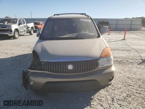 ✅ 2002 Buick Rendezvous CXL • VIN: 3G5DB03E32S520280 • Лот: 92191965. Опубликован ранее на Copart с пробегом 114 921 миль. Бесплатный доступ к архиву аукционных продаж из США и подробный отчёт об истории автомобиля на DreamBid. Изображение 5.