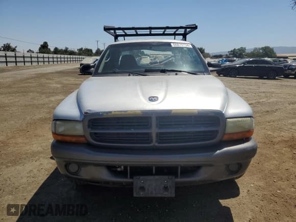 ✅ 2002 Dodge Dakota • VIN: 1B7GL12X32S557546 • Lot: 66879734. Wystawiony na Copart z przebiegiem 218 981 mil. Bezpłatny archiwum sprzedaży aukcyjnych z USA i szczegółowy raport historii pojazdu na DreamBid. Zdjęcie 5.