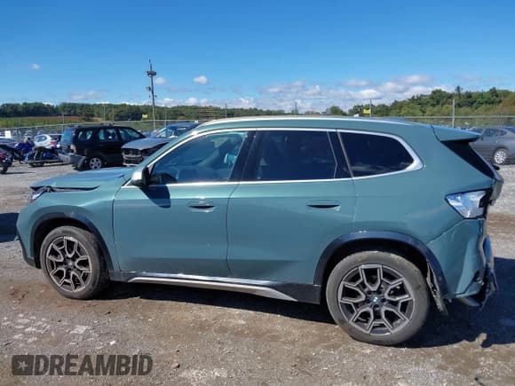 ✅ 2024 BMW X1 xDrive28i • VIN: WBX73EF05R5Y42670 • Lot: 43404248. Wystawiony na IAAI z przebiegiem 12 731 mil. Bezpłatny archiwum sprzedaży aukcyjnych z USA i szczegółowy raport historii pojazdu na DreamBid. Zdjęcie 14.