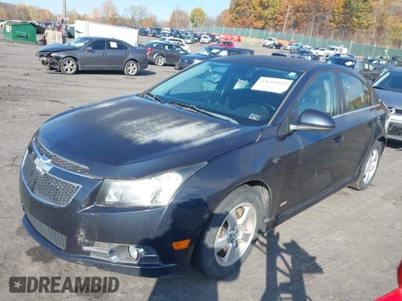 ✅ 2014 Chevrolet Cruze 1LT • VIN: 1G1PC5SB3E7363823 • Lot: 43610493. Listed on IAAI with 185,881 mi. Free auction sales archive from the USA and detailed vehicle history report at DreamBid. Image 2.