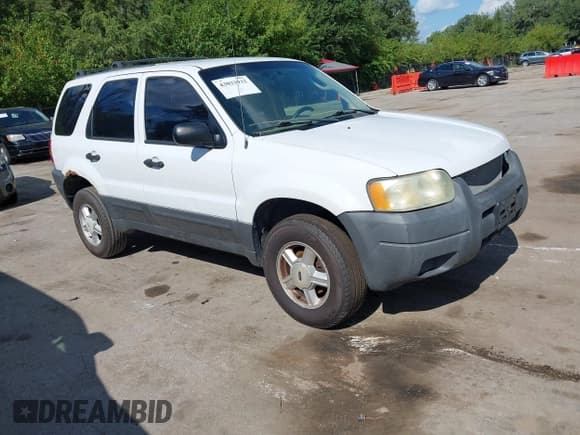 ✅ 2004 Ford Escape XLS • VIN: 1FMYU02184KA89044 • Lot: 43033932. Listed on IAAI with 211,537 mi. Free auction sales archive from the USA and detailed vehicle history report at DreamBid. Image 1.