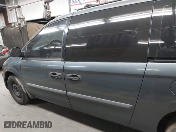 ✅ 2006 Dodge Grand Caravan • VIN: 1D4GP24R66B621399 • Lot: 41535539. Listed on IAAI with 230,801 mi. Free auction sales archive from the USA and detailed vehicle history report at DreamBid. Image 14.