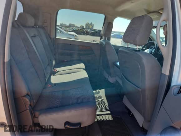 2006 Dodge 1500 SLT z VIN 3D7KR19D76G202595, wystawiony jako Copart lot #84990065 z przebiegiem 119 840 mil mil oraz Szkoda całkowita • Salvage title. Historia ofert i sprzedaży dostępna na DreamBid. Obrazek 10.