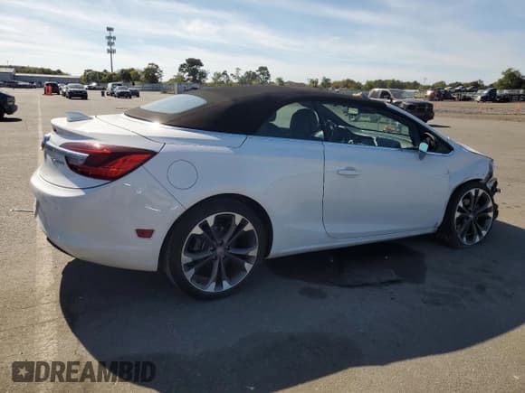✅ 2016 Buick Cascada Premium • VIN: W04WT3N57GG063471 • Lot: 81927475. Listed on Copart with 35,334 mi. Free auction sales archive from the USA and detailed vehicle history report at DreamBid. Image 3.