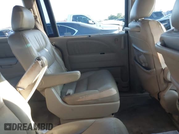 ✅ 2005 Honda Odyssey EX-L • VIN: 5FNRL38765B117138 • Lot: 42970831. Listed on IAAI with 269,676 mi. Free auction sales archive from the USA and detailed vehicle history report at DreamBid. Image 8.