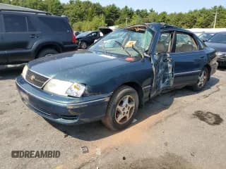 ✅ 1999 Toyota Avalon XL • VIN: 4T1BF18B1XU351193 • Лот: 71301294. Опубликован ранее на Copart с пробегом Не указан. Бесплатный доступ к архиву аукционных продаж из США и подробный отчёт об истории автомобиля на DreamBid. Изображение 1.