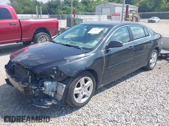 ✅ 2012 Chevrolet Malibu 1LS • VIN: 1G1ZB5E05CF321405 • Lot: 42998627. Listed on IAAI with 200,623 mi. Free auction sales archive from the USA and detailed vehicle history report at DreamBid. Image 2.