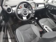 ✅ 2008 MINI Hardtop • VIN: WMWMF33538TU68174 • Lot: 52599285. Listed on Copart with 150,496 mi. Free auction sales archive from the USA and detailed vehicle history report at DreamBid. Image 8.